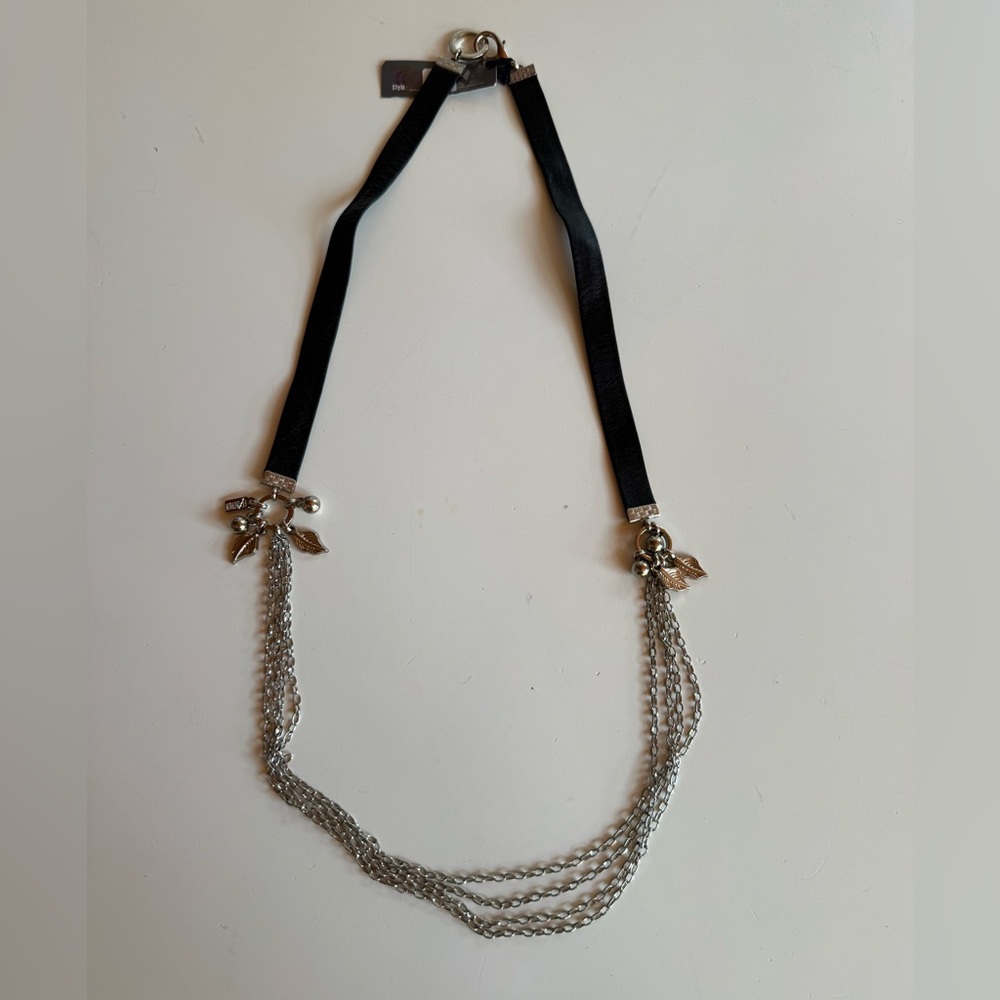 Fixation clunky necklace with bangles and leather strap.